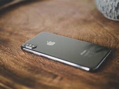 Image result for iphone 11 facing down on a tables