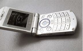 Image result for Old Cell Phones Silver Flip Phone