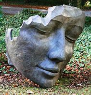 Image result for Garden Face Sculpture