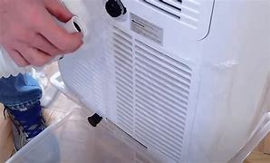 Image result for Fire Damaged Portable Air Conditioner