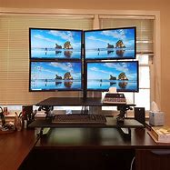 Image result for 4 Monitor Desk Setup
