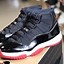 Image result for Bred 11s Air Jordan Shoes Tongue Tags Vertical