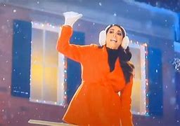 Image result for Verizon iPhone 15 Pro Christmas Caroling Commercial