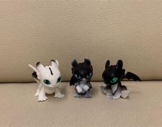 Image result for Light Fury Dragon and Toothless Babies