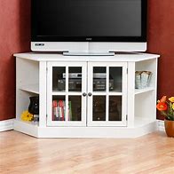 Image result for Tall Corner TV Cabinet with Doors