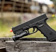Image result for Airsoft Glock 17 with ACOG Sight