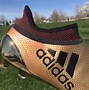Image result for Adidas Pink Football Boots with Gold Studs