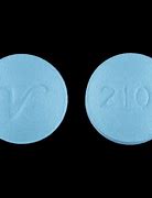 Image result for Small Round Light Blue Pill