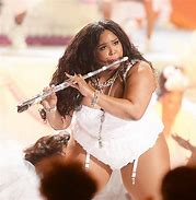Image result for Lizzo Blowin a Flute
