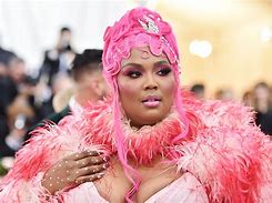 Image result for Lizzo Gold Cape