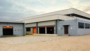 Image result for Clothing Factory Building