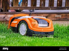 Image result for Orange Robot Lawn Mower