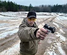 Image result for One Hand Pistol Shooting