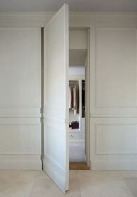 Image result for Hidden Wall Panel Door White