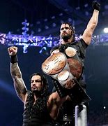 Image result for Seth Rollins Pinning Roman Reigns
