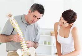 Image result for Person Talking with Chiropractor