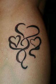 Image result for hearts swirls tattoos