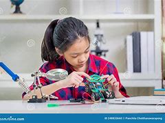 Image result for Girl Building Robotic Car