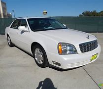Image result for 04 White Cadillac DeVille On Flat Bed Truck