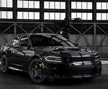 Image result for Black Mustang and Black Charger