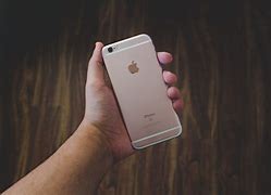 Image result for iPhone 5 Plus in Hand