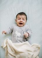 Image result for Crying Baby On Bed