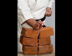Image result for Pictures of Breaking Bricks
