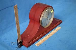 Image result for Cast Iron Ansonia Mantle Clock