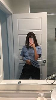Image result for Girl with Blue Phone Case in Mirror in School Bathroom