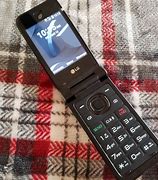 Image result for LG Classic Flip Lock Phone