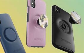 Image result for Peron Holding iPhone with Pop Socket