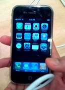 Image result for iPhone in Hand with Glove