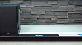Image result for how to setting up a soundbar with a subwoofer in a room