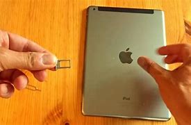 Image result for iPhone A2595 Sim Card Slot