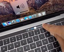 Image result for MacBook Pro Touch Bar Complex