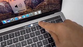Image result for MacBook Pro with Touch Bar Run Over with Car
