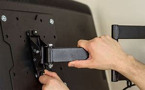 Image result for Wall Mount Screw Holes On a 65 Philips Roku TV for 65Pul6553