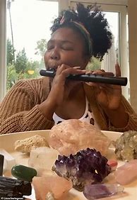 Image result for Lizzo Playing Crystal Flute