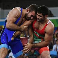 Image result for Olympic Wrestlers Out of Singlet