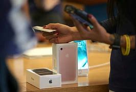 Image result for Someone Buying an iPhone