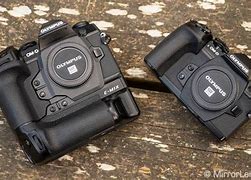 Image result for Olympus E-M1 MK2 Battery Charger