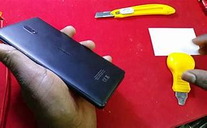 Image result for Opening a Nokia Phone