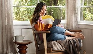 Image result for Woman Reading Kindle