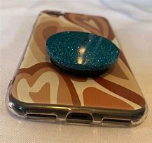 Image result for Phone with a Popsocket On It