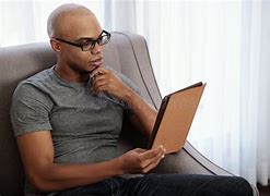 Image result for Black Man Reading Book