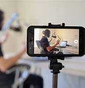 Image result for Person Recording On Cell Phone