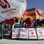Image result for Protests Against the Beijing Olympics