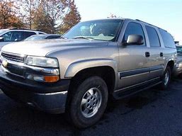 Image result for Chevrolet Suburban 2003 Gold