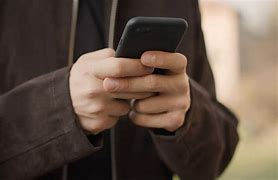 Image result for Man Texting On Mobile Pjhone