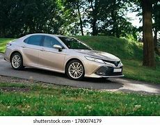 Image result for Toyota Camry Black Nightshade with Copper Wheels